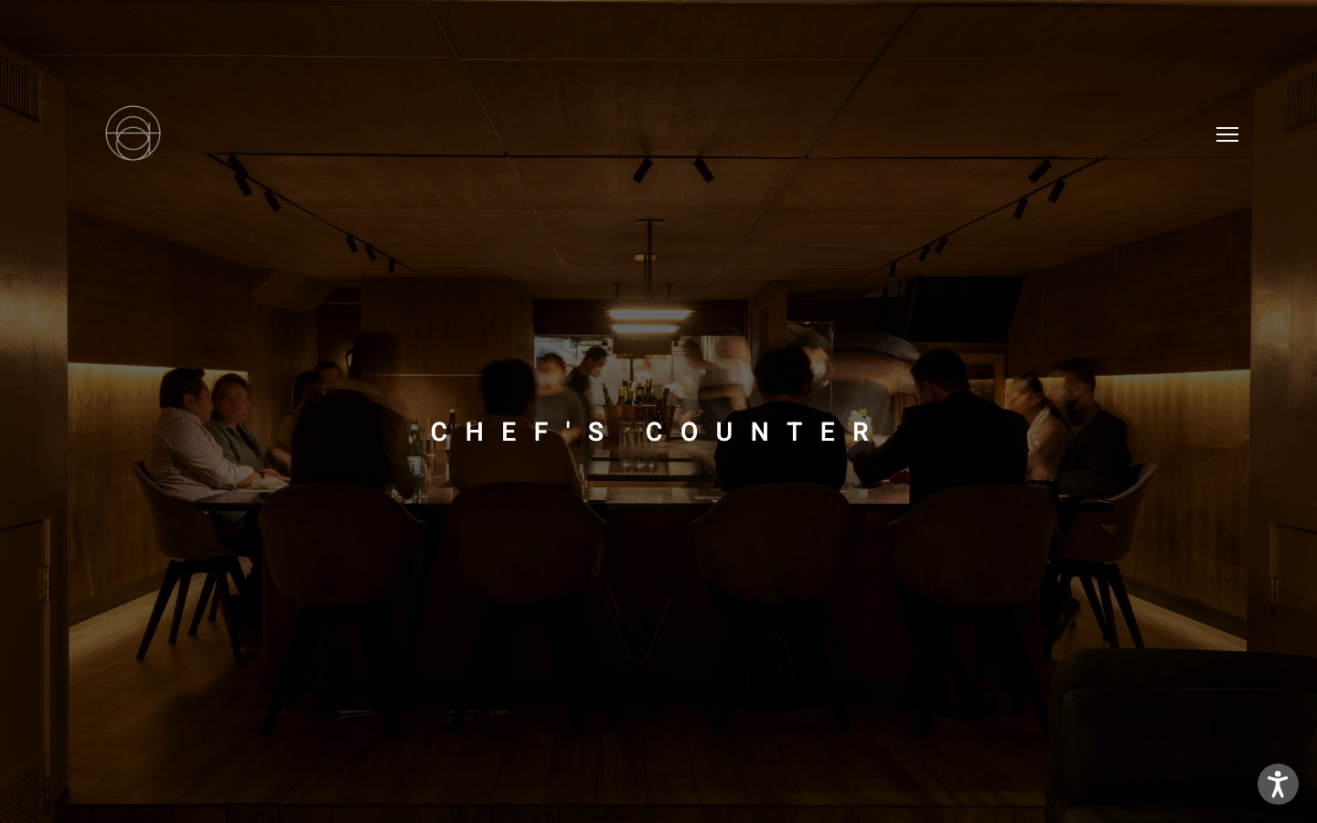 The layout is split, with a dark, patterned background contrasting with clean, sans-serif typography. The overall feel is sophisticated and understated, prioritizing visual texture and a sense of curated elegance. · restaurant website, fine dining design, minimalist hospitality, dark mode restaurant, editorial website, split screen layout, luxury restaurant, modern restaurant design, atelier website, restaurant navigation
