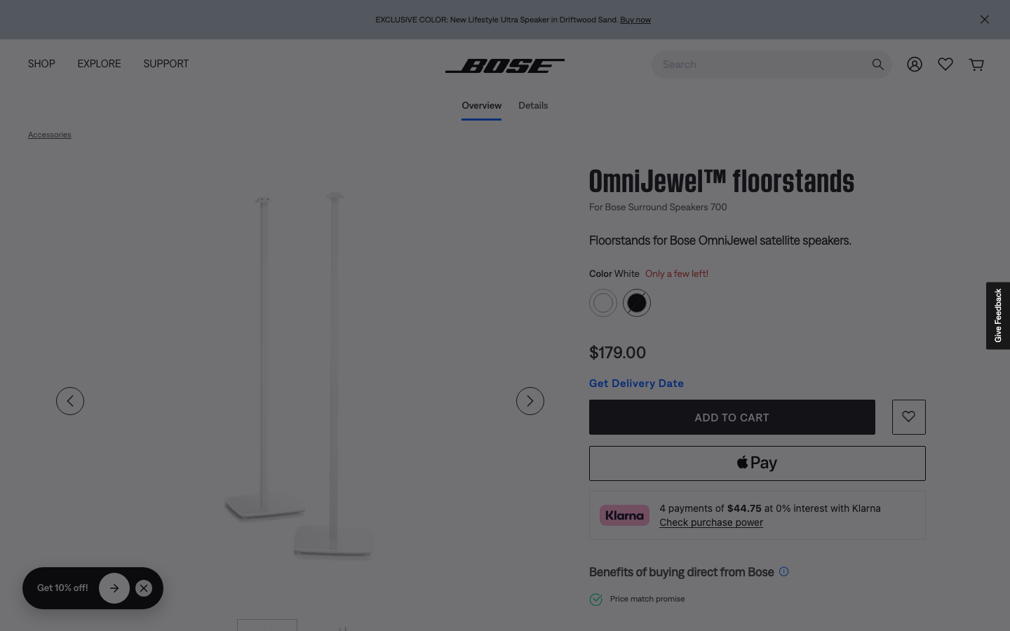 The page uses a full-screen image and minimal text to establish a sophisticated, tech-forward mood. The dark background and subtle purple lighting emphasize the product's sleek design. · audio product, smart speaker, home audio, tech website, minimalist design, dark theme, bose product page, multiroom audio