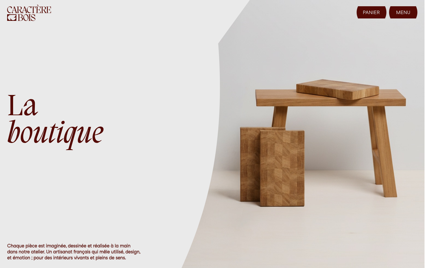 Caractère Bois · La Boutique - A high-end artisanal aesthetic featuring a soft, organic split between a neutral cream background and a product photograph. The use of a refined serif typeface in a deep burgundy creates a sophisticated, gallery-like mood.  ·  artisan furniture hero, minimalist ecommerce, editorial serif typography, warm neutral palette, luxury woodworking web design