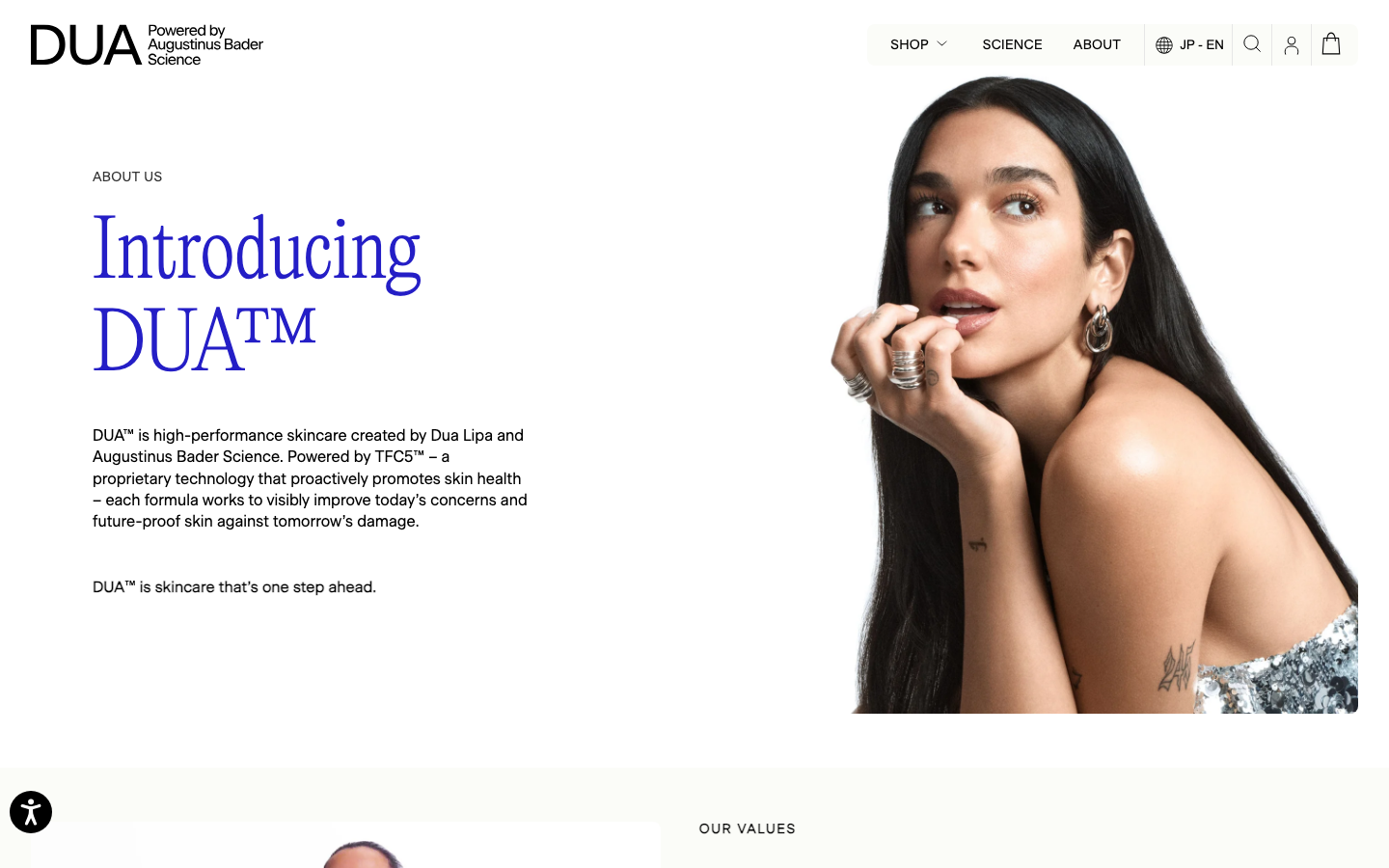 High-contrast editorial layout featuring a bold blue serif headline paired with a large, clean studio portrait. The composition relies on generous white space and a strict asymmetric split. · luxury skincare landing page, editorial beauty layout, serif headline blue, minimalist ecommerce about page, high fashion typography