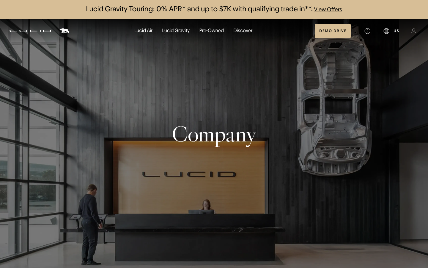 The hero image dominates, showcasing the vehicle in a vast landscape. Clean typography and ample negative space create a sense of premium simplicity. The overall feel is sophisticated and understated. · electric car, luxury vehicle, car design, automotive, futuristic car, lucid gravity, minimalist car, desert landscape