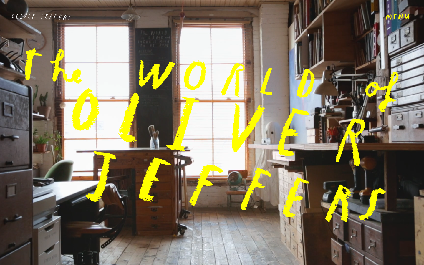 Oliverjeffers - The layout prioritizes a strong typographic hierarchy with large, hand-drawn lettering against a backdrop of a cluttered studio space. The overall feel is informal and personal, emphasizing the creative process.  ·  illustrator portfolio, studio website, typography design, creative website, hand-lettering, editorial design, artist website